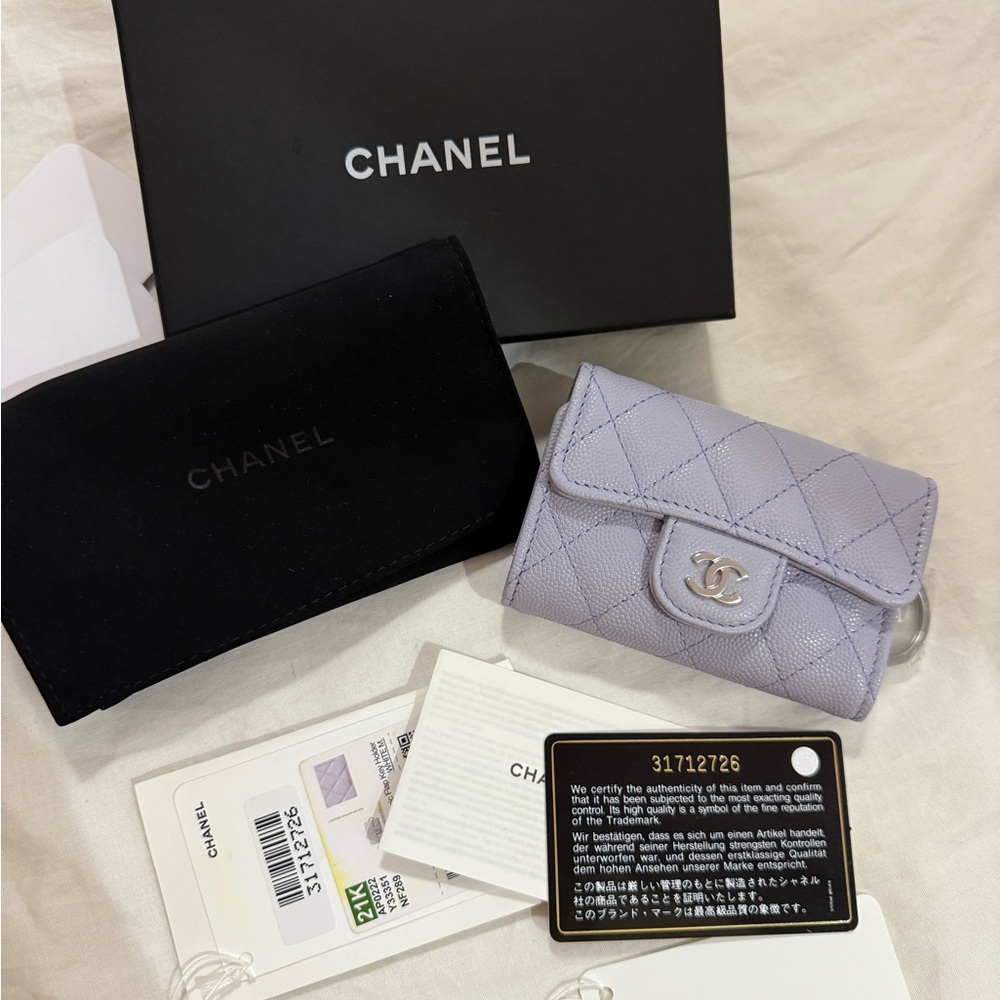 Brand new Chanel classic flap light lavender 4 key holder